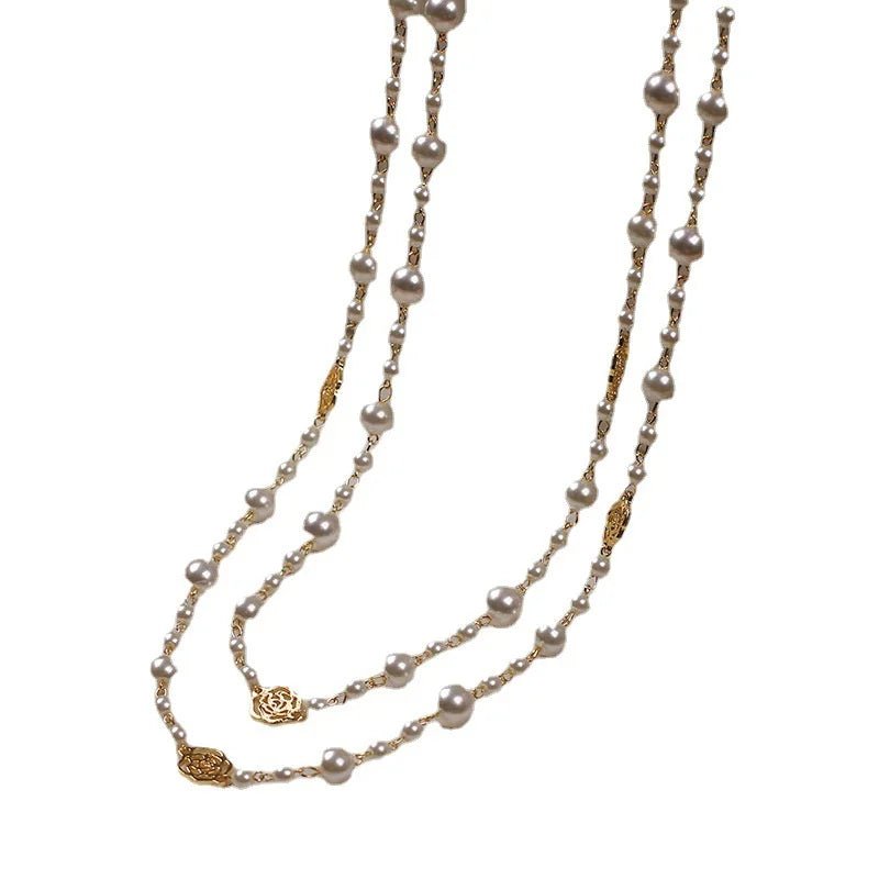 Collier long vintage en perles de camélia - deslyshopping
