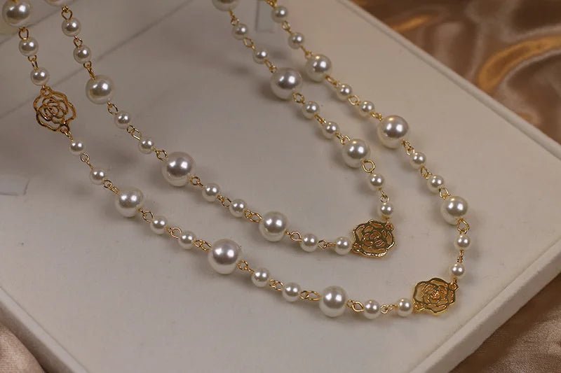 Collier long vintage en perles de camélia - deslyshopping
